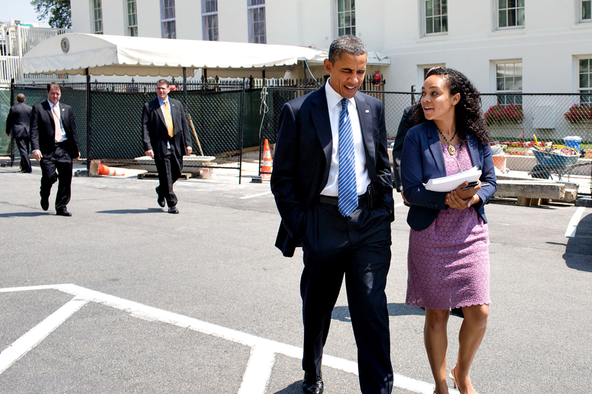 image of Monique Dorsainvil walking with President Obama