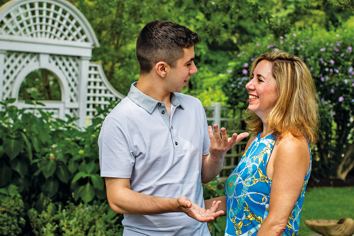 Alec Russin and his mom, Andrea Russin, in the yard of their home in Princeton, New Jersey.
