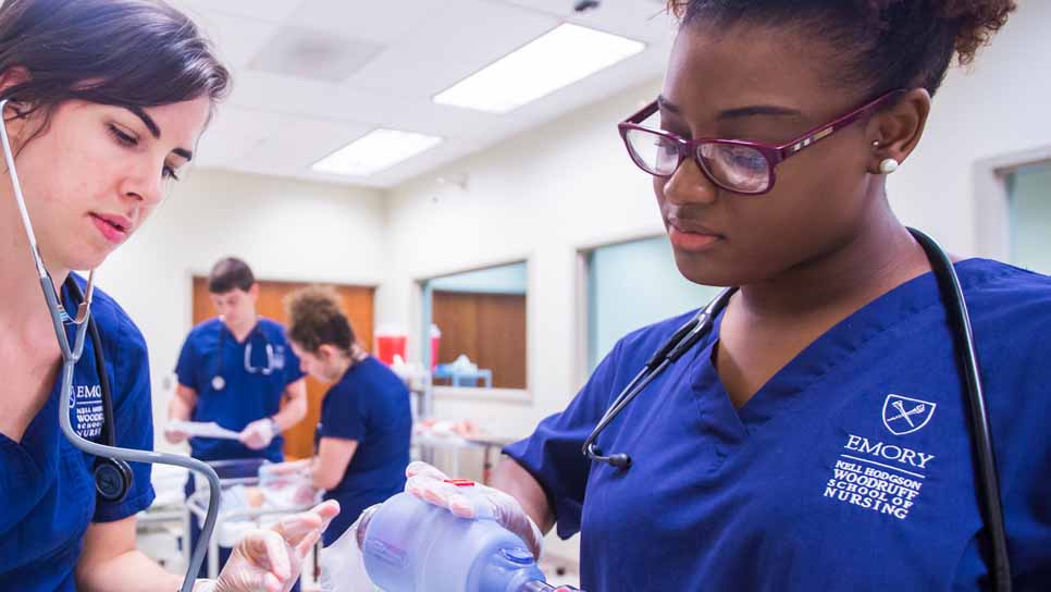nursing students in scrubs in clinical training