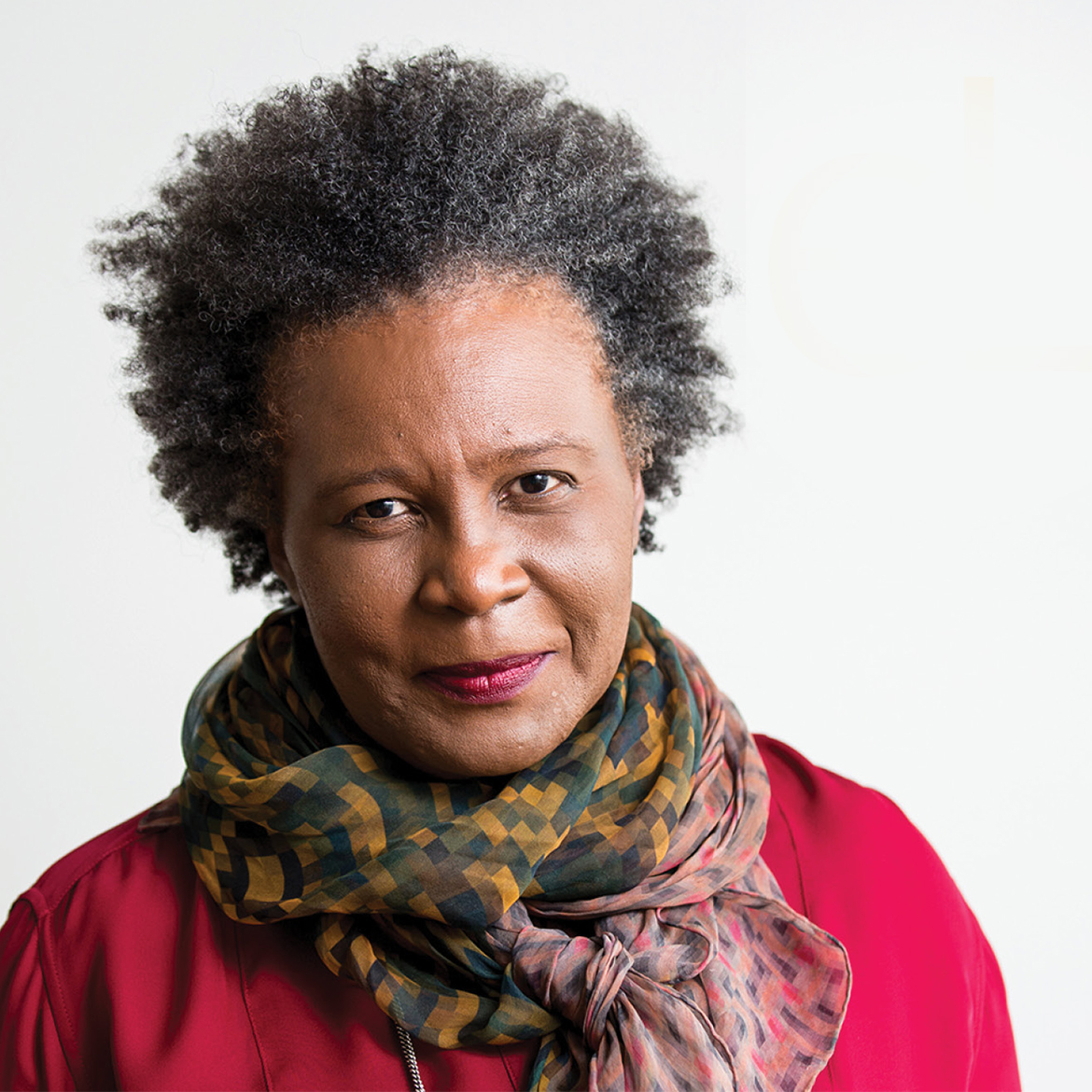 claudia rankine wearing a red blouse